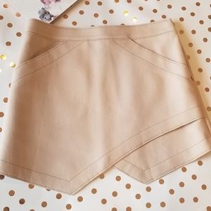 Bcbg leather envelope mini skirt.Size 4. Pale pink